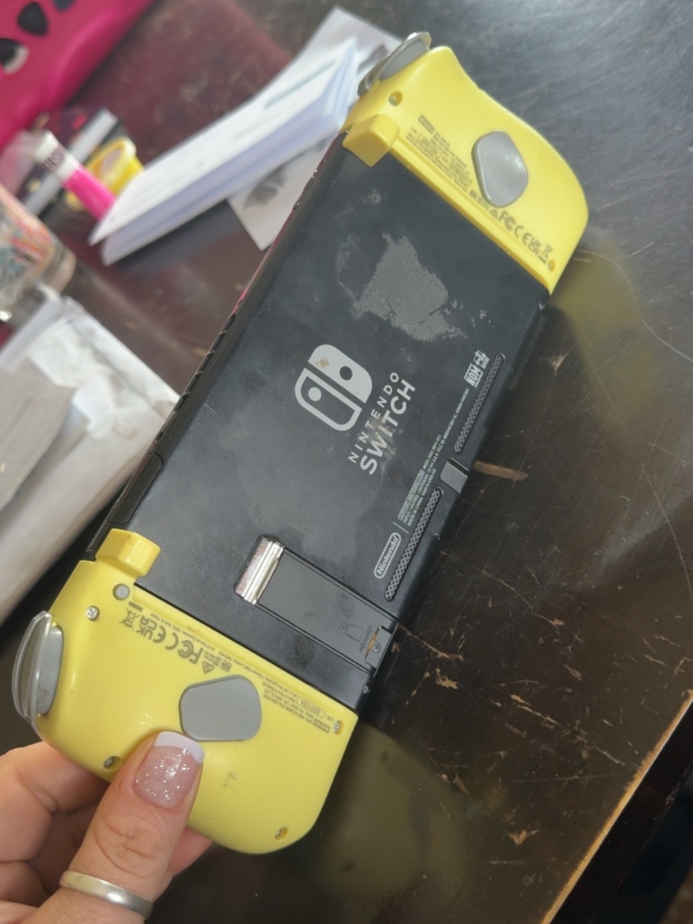Nintendo Switch with Yellow Grip Accessories